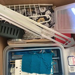 Lots of crafts art supplies painting crochet needles and yarn