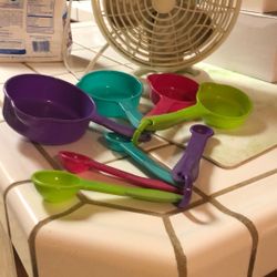 Multi- Color Measuring Cups & Spoons $4. 