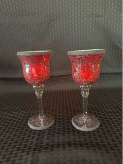 Two red candle holders