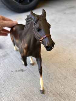 Two Breyers Horse figures