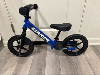 Like new- strider 12 balance bike