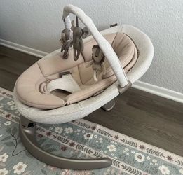Nuna leaf grow baby seat and rocker with toy bar