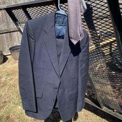 Four Piece Suits Got A Jacket, A Vest Pants And Two Ties