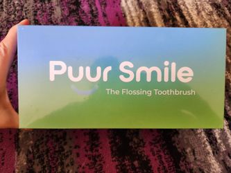 Puur smile flossing toothbrush