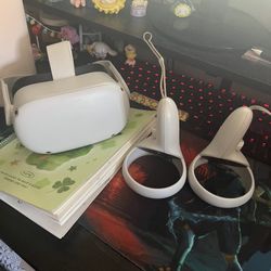 Oculus Meta Quest 2, With Remotes (batteries Included), New strap And Grips, & Linking Cable. No Box