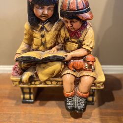 Boy And Girl Statue