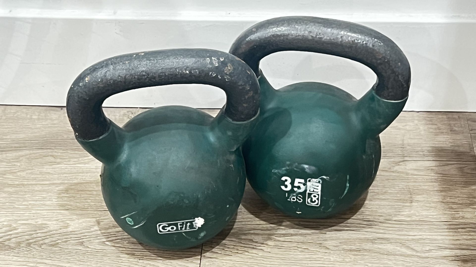 Two 35 Pounds And One 25 Pounds kettlebells