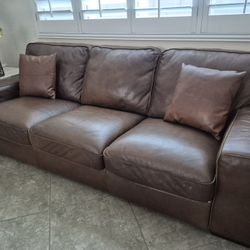 NATUZZI Leather Sofa. 