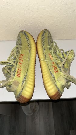 Yellow Yeezy trainers