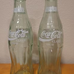 8 oz Coca Cola Classic bottle. Barcelona '92. Sharing The Olympic Ideal

- 2 Bottles