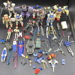 Gundam bandai mobile suit Action Figure lot of 10 with guns weapons and misc.