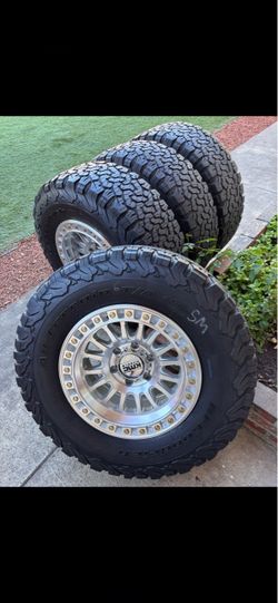 KMC new rims and 285/70/17 tires wheels and tires Chevy Toyota Tacoma 4Runner rims tires