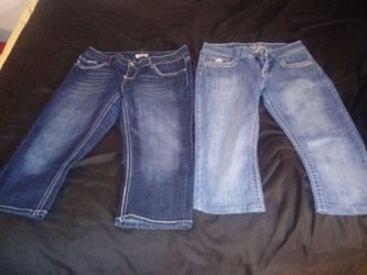 two pair of size 11 womens capris