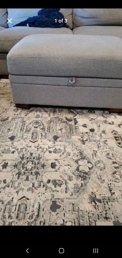 Gray storage ottoman