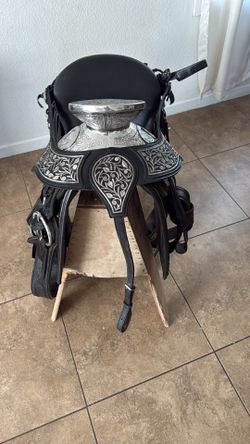 Silver wear horse saddle