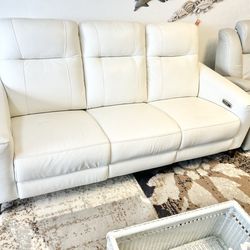 Like new leather electric dual reclining couch with electric headrests and dual USB