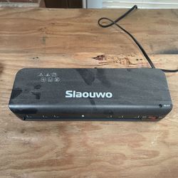 Laminator Slaouwo 