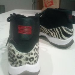 JORDAN 11 ANIMAL INSTINCT