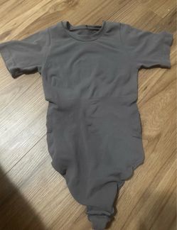 Tight grey shirt