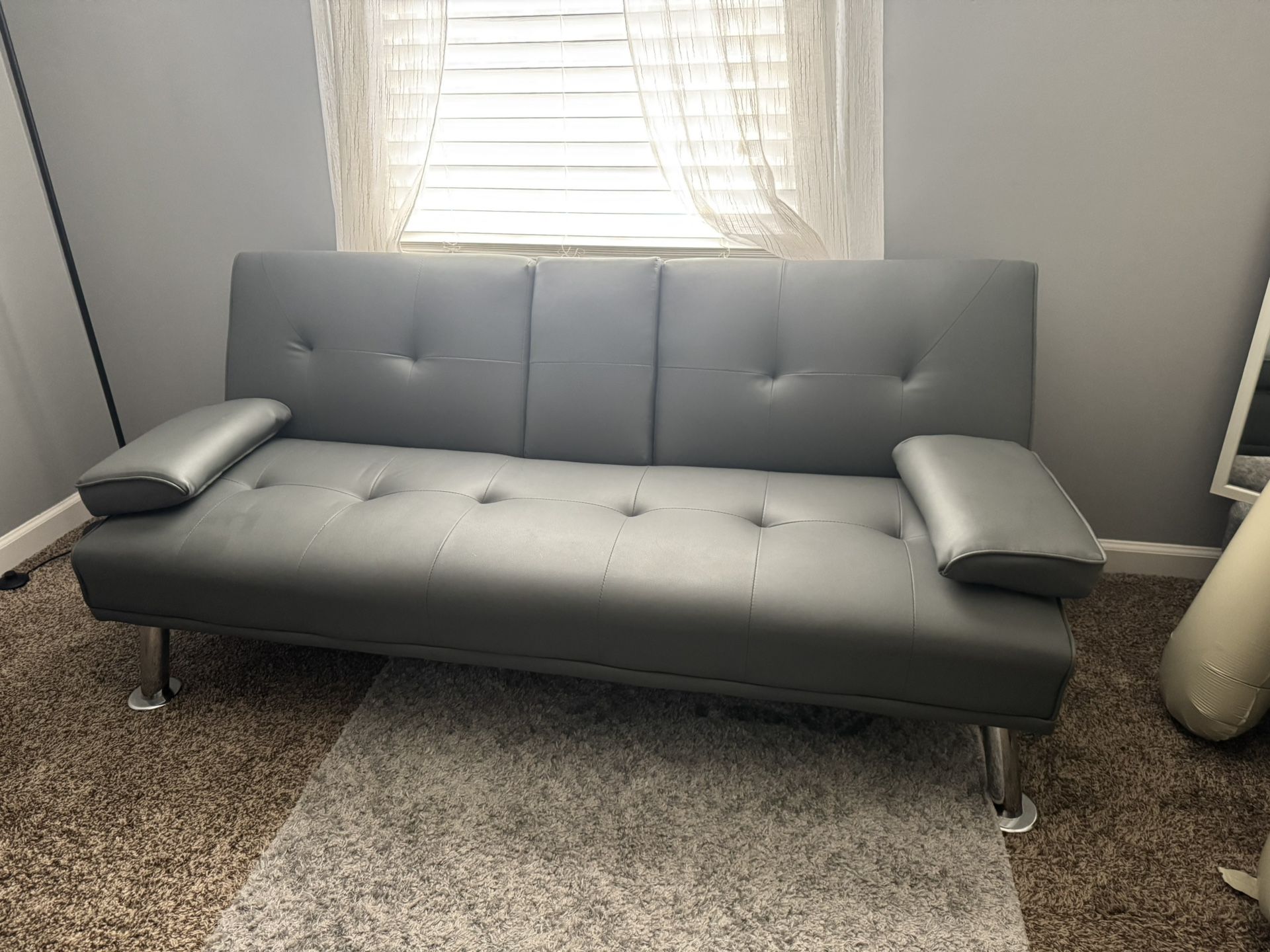 Small little gray couch