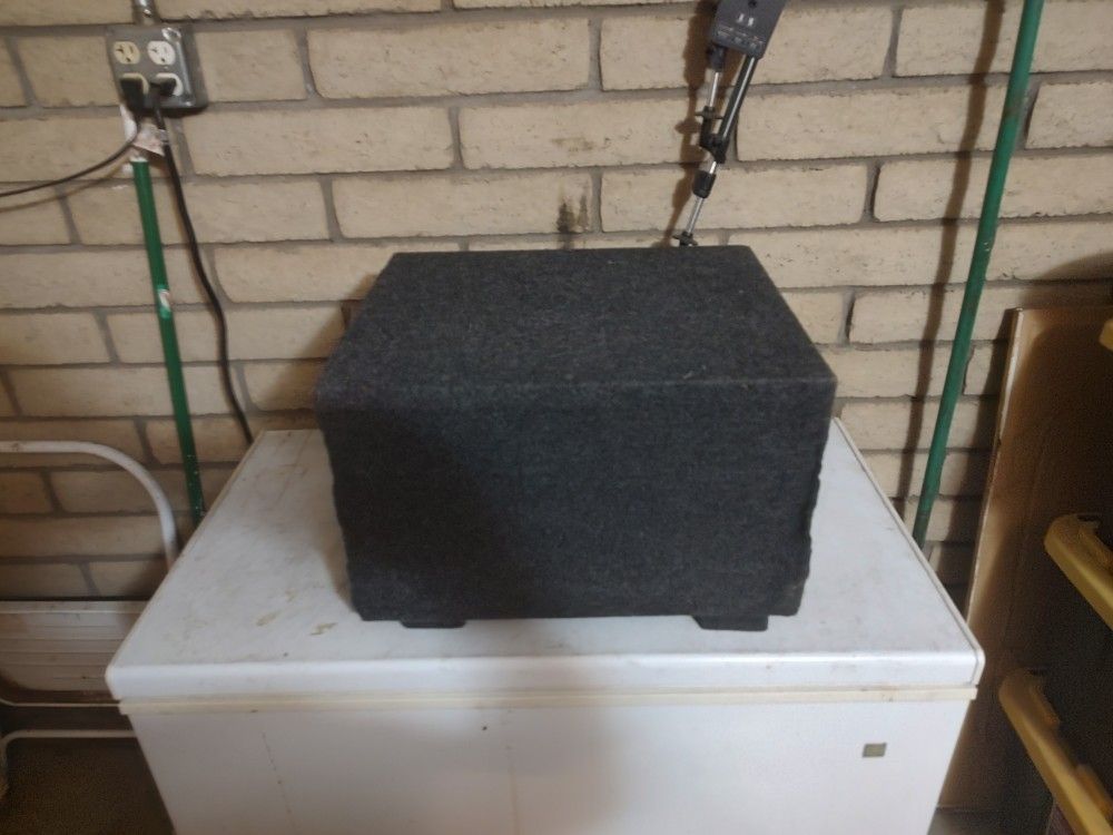 12" Skar Audio Sub In a sealed enclosure.