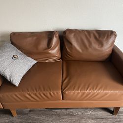 2 Person Rusty Colored Couch 