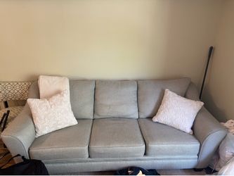 Light grey sleeper sofa with pullout queen size bed