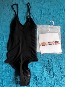 Vody color negro de mujer T M/L nuevo