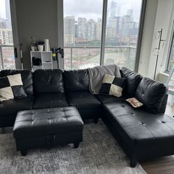 Black Couch With Ottoman And Rug