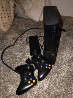 xbox 360 with 2 games