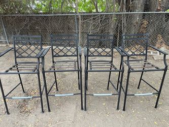 Four steel framed chairs