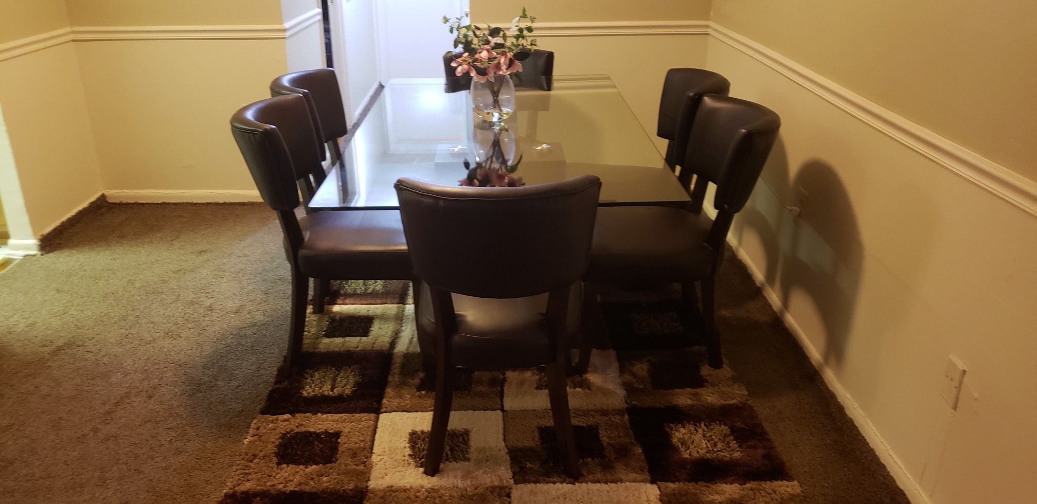 Glass dining table with 6 chairs