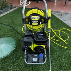 Powerful Ryobi pressure washer. Has 3300 PSI and 2.4 GPM, gas powered. Comes with a 1 gallon soap tank and automatic soap dilution. Includes hose and 