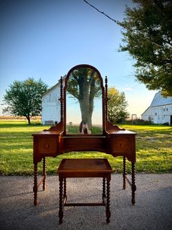 Beautiful Refinished Jenny Lind Vanity with Cane Webbing Stool. This piece is stunning with all the classic Jenny Lind spindles. Some areas had to be