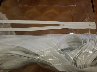 White ZIPPERS , LOT- 120 pieces. Brand new, great for pillow cases, bags, any of arts & crafts. 22" L each.
