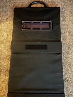 Folding ballistic shield