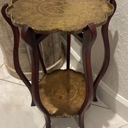 Asian Table $135. LaBarge Dolphin Sea Lions Oval Brass Coffee $300. HUGE Bronze Horse Statue $1,500. Lion Clock $250. Signed Italian Planter $200.