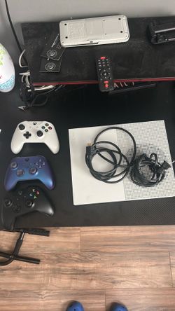 This is a Xbox one S with 3 Xbox controllers