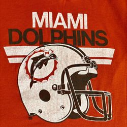 Vintage 1980’s Miami Dolphins Orange Graphic T-Shirt by Trench Mfg. Co. Size Medium