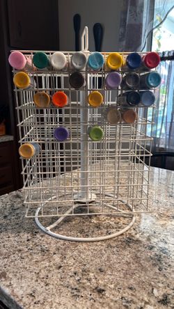 Large rotating paint storage rack