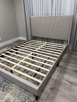 Beige full size bed frame