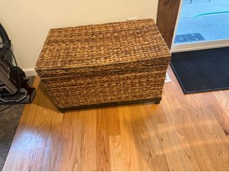 Wicker storage piece of furniture.