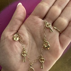 14k FANCY CHARM BRACELET 