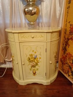 Half moon floral cabinet