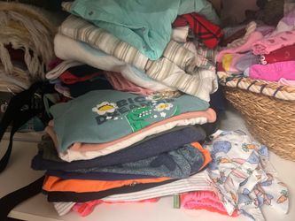 Baby clothes and books