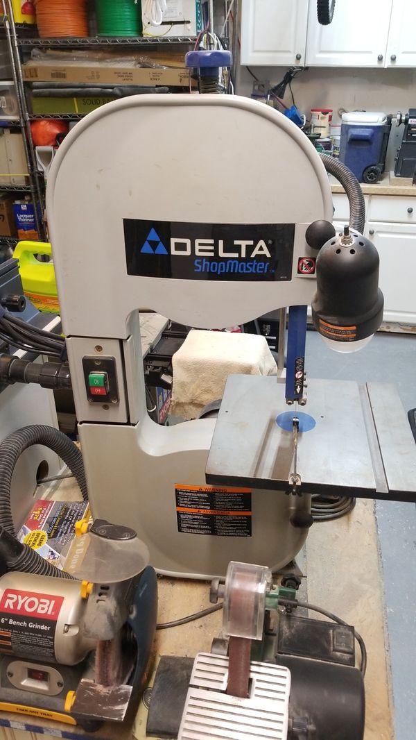 Delta Shopmaster 10 inch band saw bs150ls, 2 extra blades and miter for