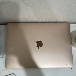 Pink Mac laptop model A1932