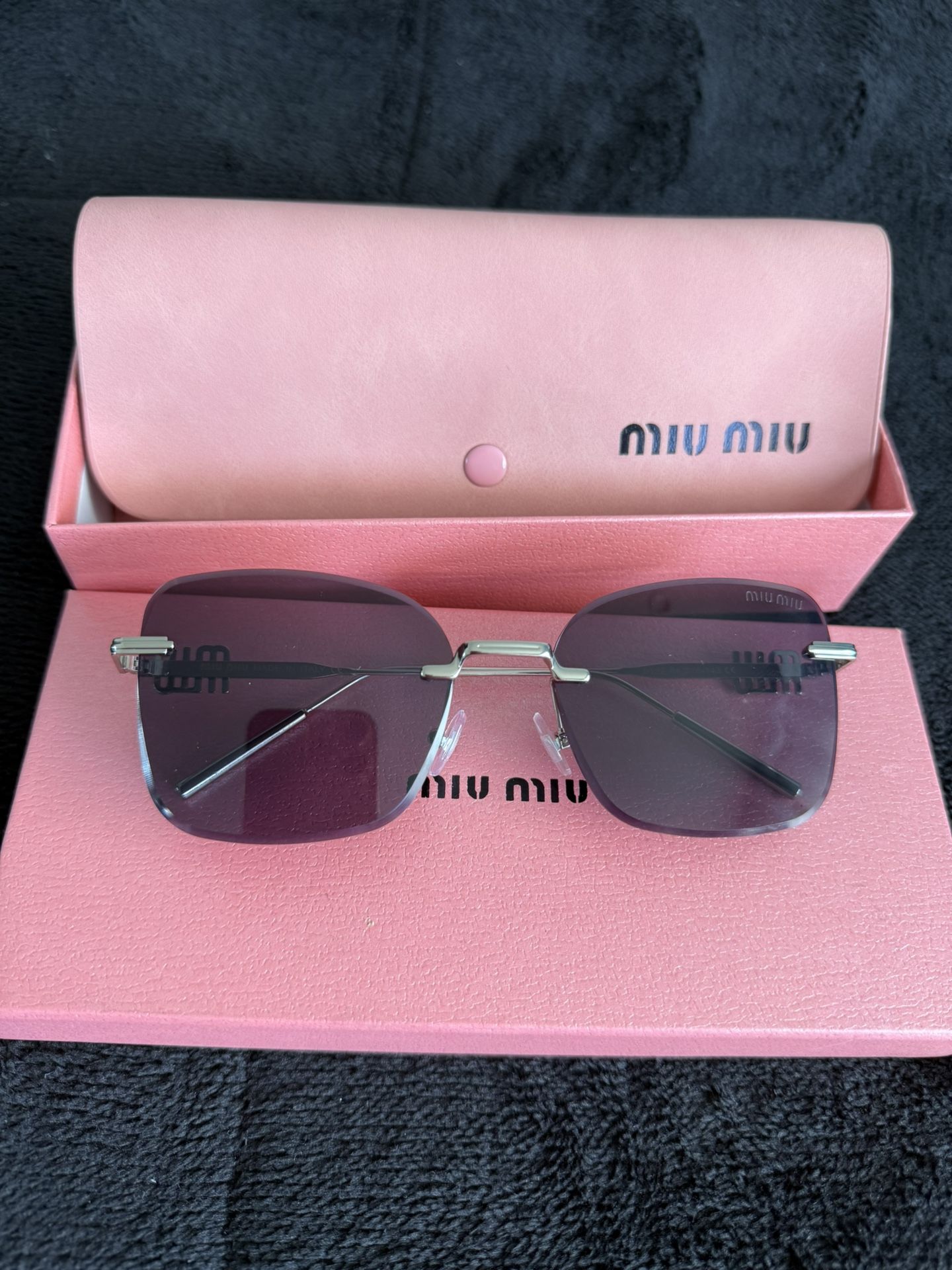 Sunglasses Miu Miu