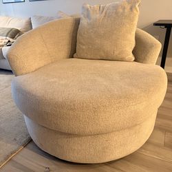 Cream swivel chair / love seat