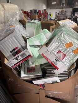 Pallet full of ceiling and wall registers multiple sizes